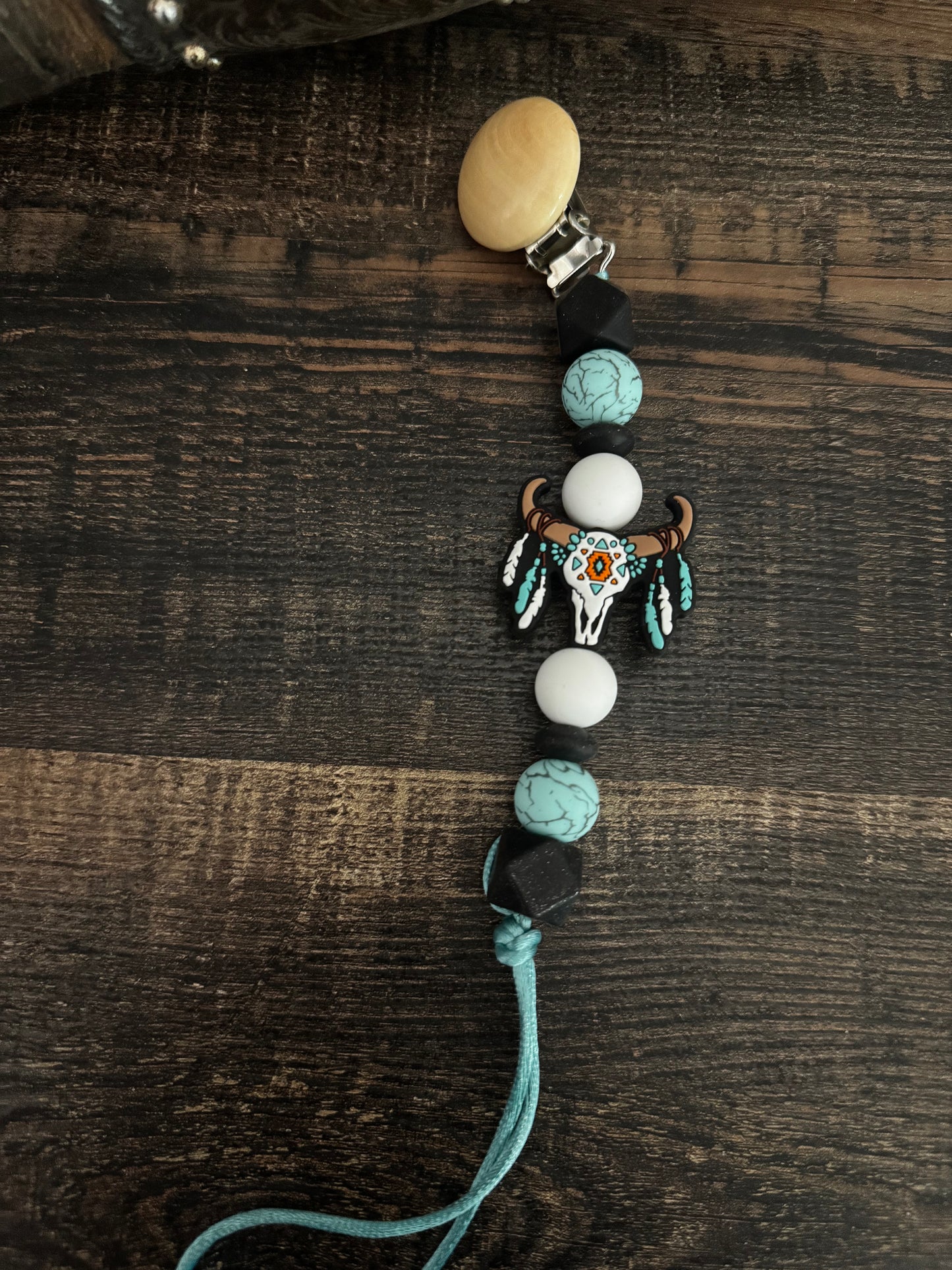 Blue Feathered Skull Silicone Pacifier Clip