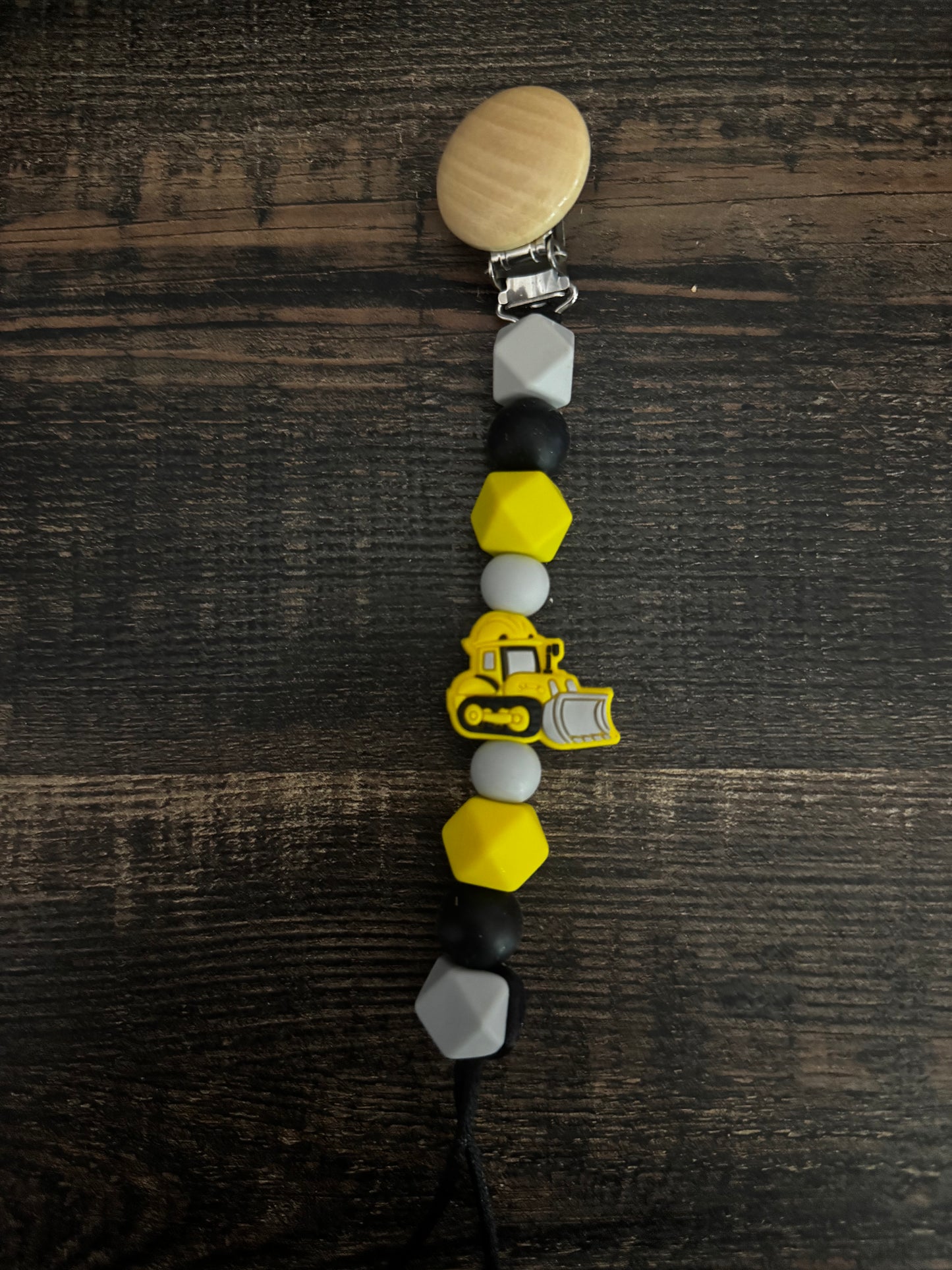 Grey Yellow Bulldozer Silicone Pacifier Clip