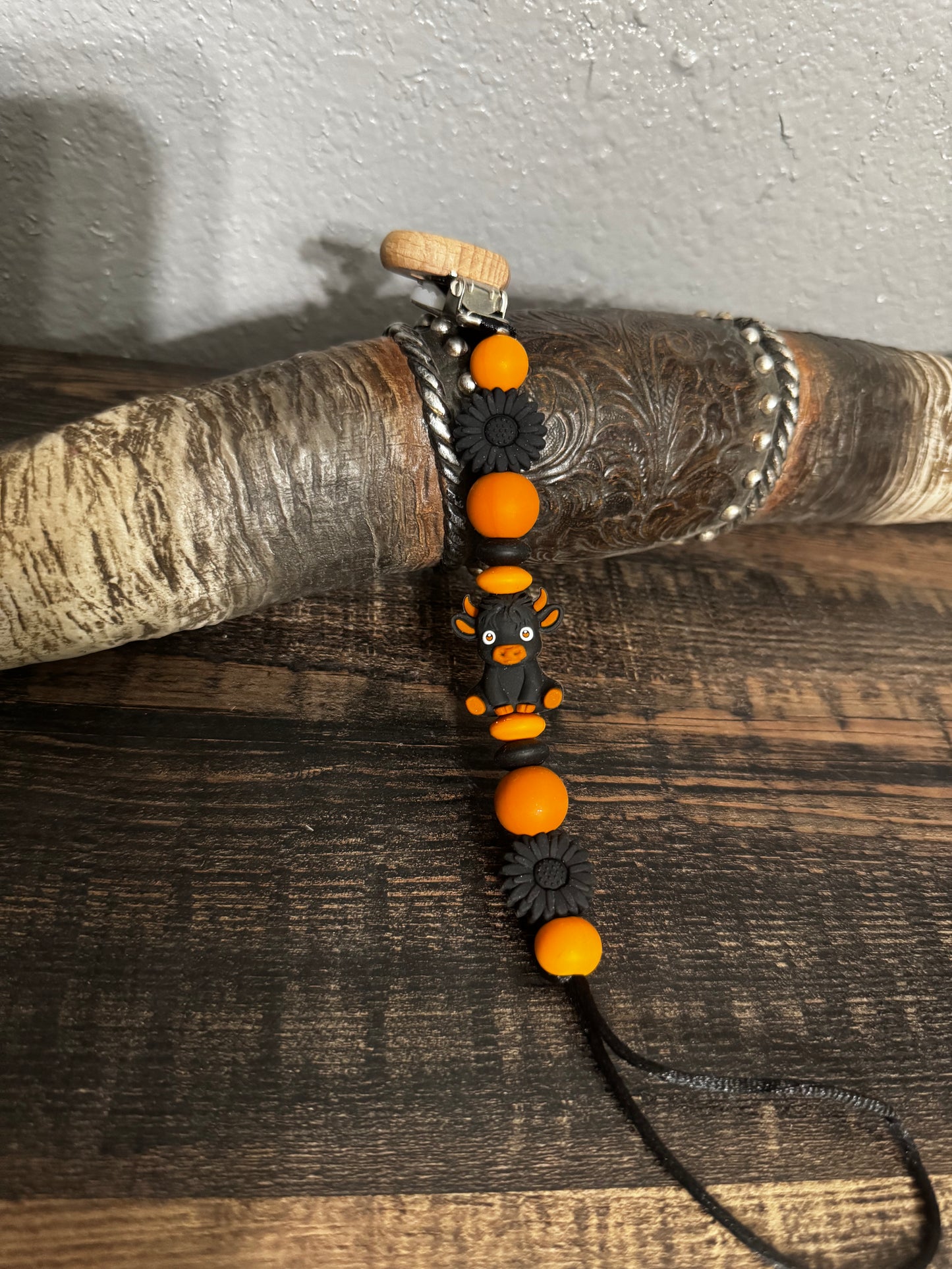 Black N Orange Highland Cow Silicone Pacifier Clip