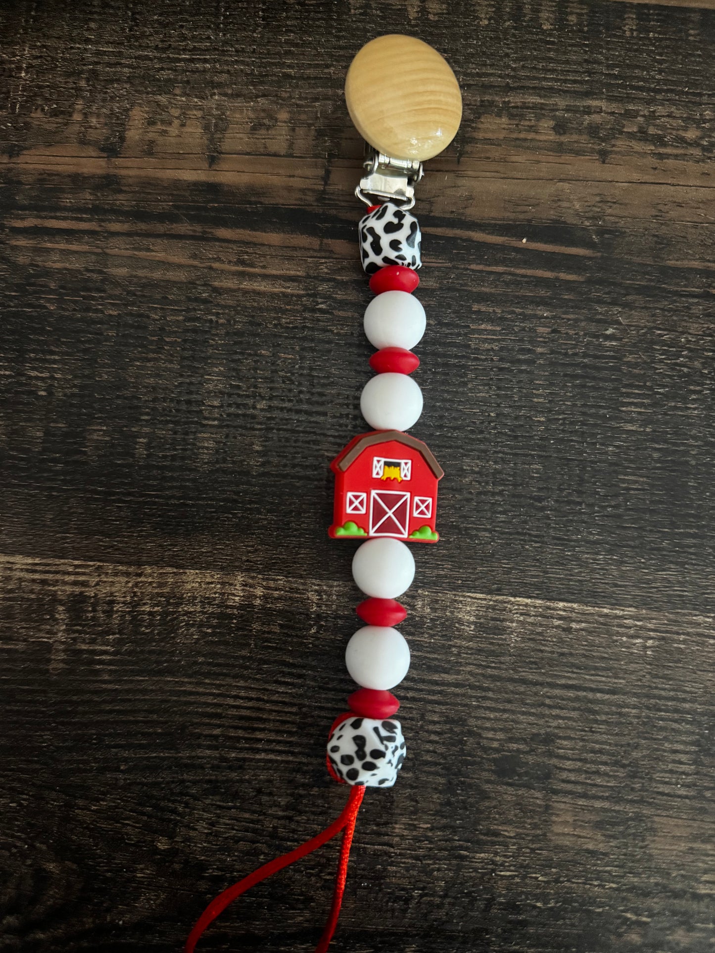 Cow Print Red Barn Silicone Pacifier Clip