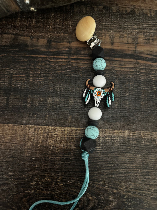 Blue Feathered Skull Silicone Pacifier Clip