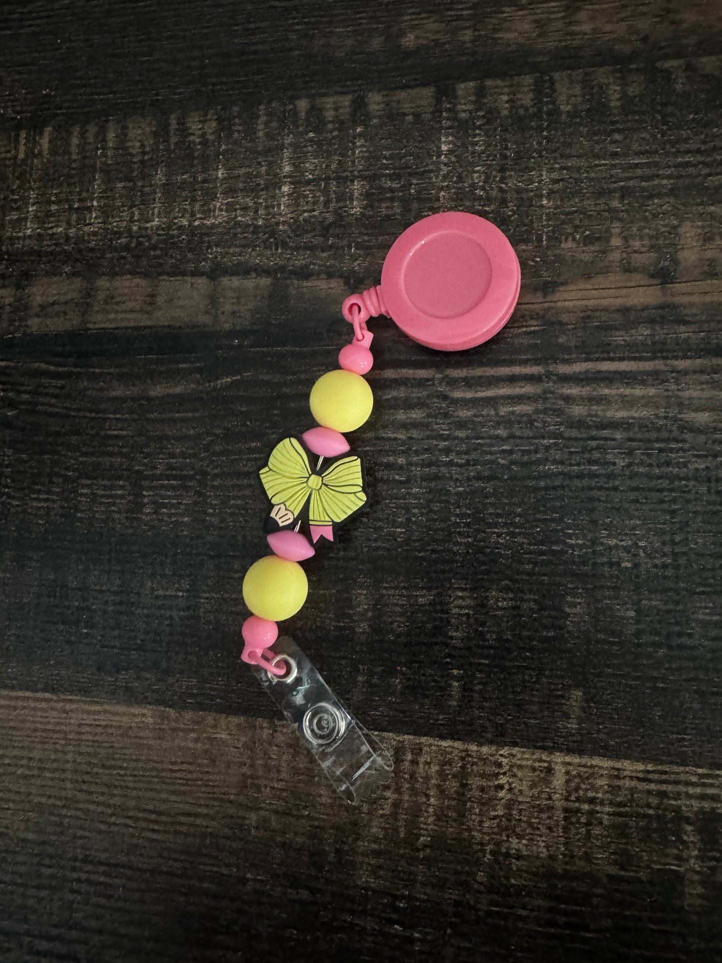 Pencil Bow Badge Reel